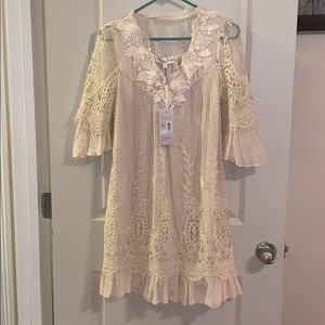 Linen, embroidered cream colored dress